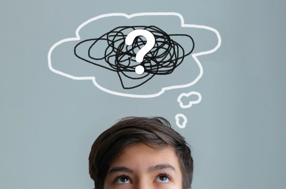 Confused person with question mark thought bubble.