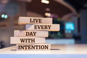 Wooden blocks say 'Live Every Day With Intention'