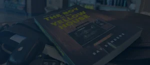 Book titled 'The Boy in the Yellow House'