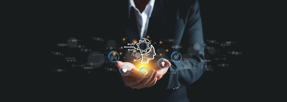 Person holding digital gears and technology icons